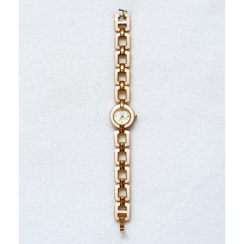 Studio gold and ivory colored enamel watch